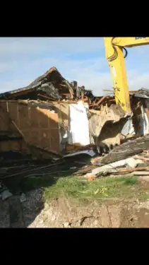 Click Here To Enlarge This Photo Of Housing Demolition